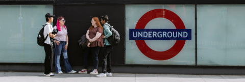 students outside London underground station