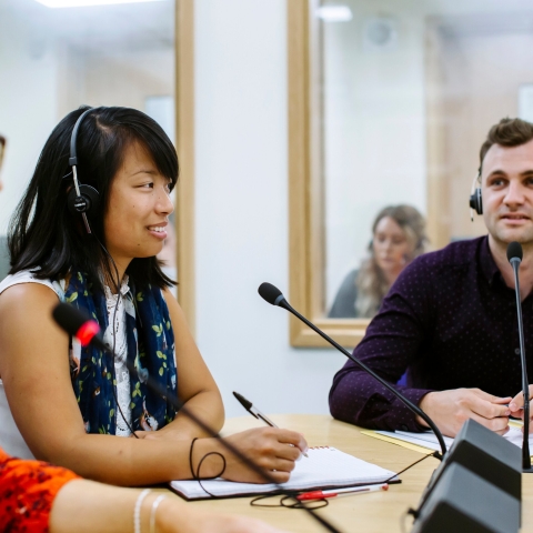 Translators working in translation suite