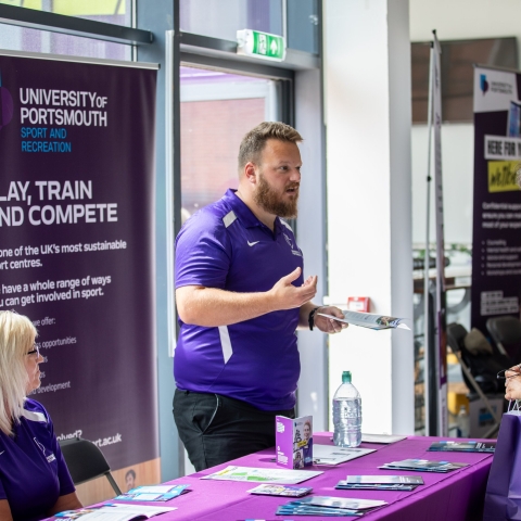 Parents and students talking with staff at the information fair  - Open Day 2023