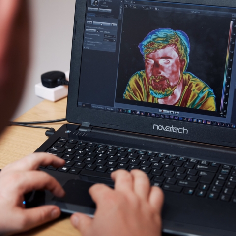 University of Portsmouth student playing around with thermal imaging on a computer