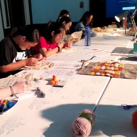 Students making cushions at a workshop