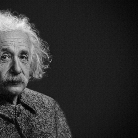 A black and white photo of Albert Einstein