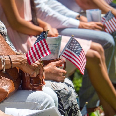 Image shows two small American flags