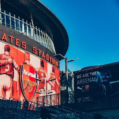 Emirates stadium with Arsenal FC logo - Photo by Nelson Ndongala on Unsplash