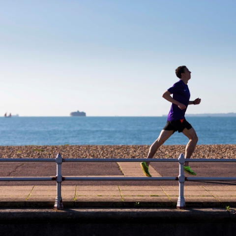 Person running on Southsea seafront