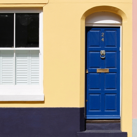 Colourful house with blue front door