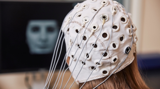 Person performing a test using an EEG