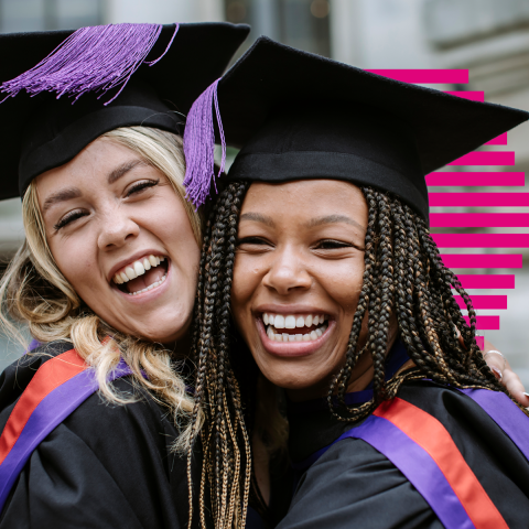 Two students graduating from the University of Portsmouth