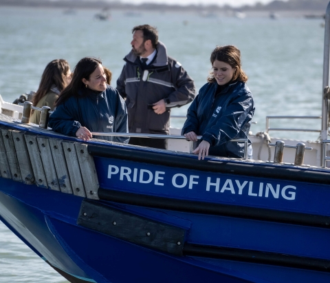 HRH Princess Eugenie on a boat in Langstone Harbour 