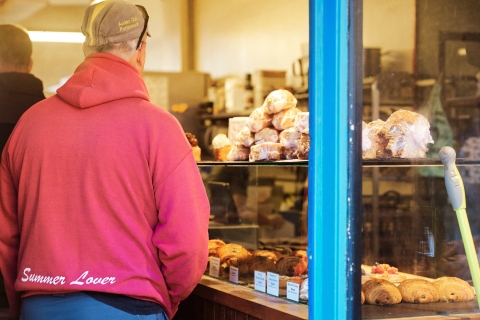 Shopper in Pink Hoodie examining food on display
Bread Addiction - Elm Grove - City Guide 2022