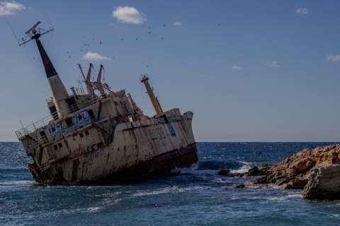 Shipwreck on the shore by a beach