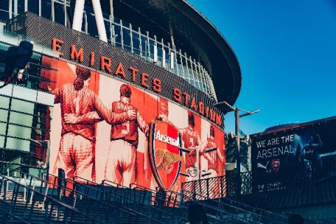 Emirates stadium with Arsenal FC logo - Photo by Nelson Ndongala on Unsplash