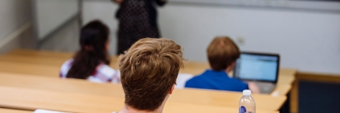 Male student in a lecture theatre