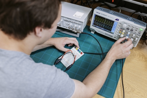 Student using the equipment in the power electronics lab