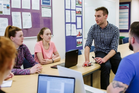 Students and lecturer in a classroom