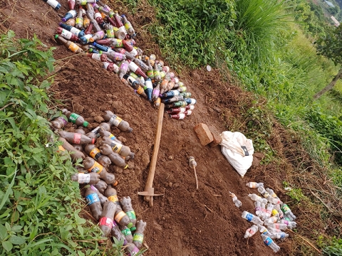 Plastic bottles being filled with soil by the Waste Wise Project in Kampala