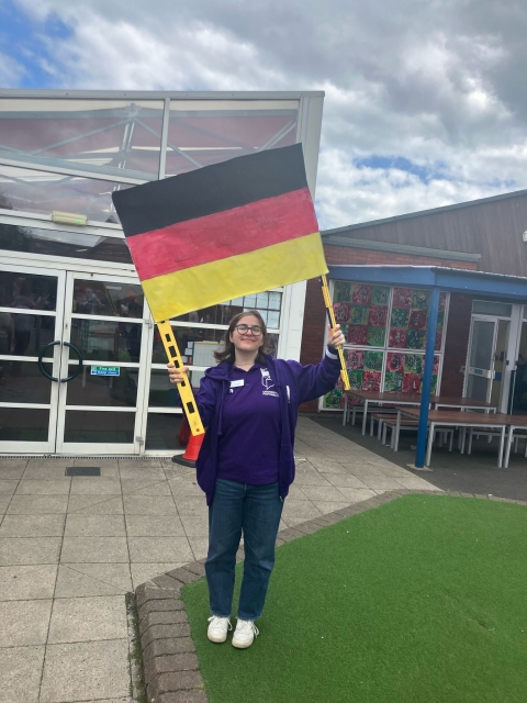 Student with a flag of Germany.