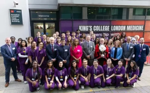 Group of medical students and staff outside Portsmouth's medical facilities