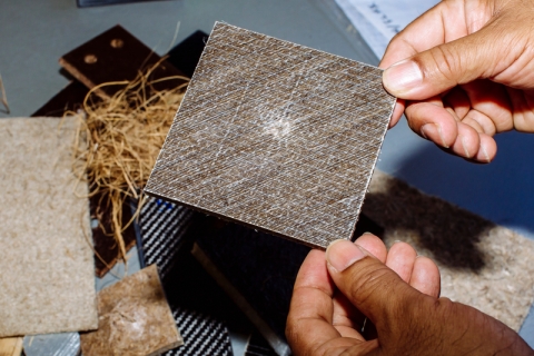 Composite material held by researcher