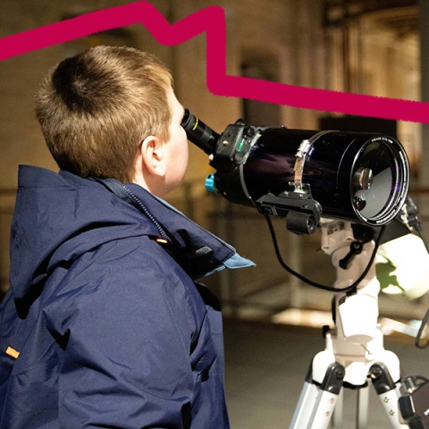 Student using telescope