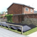 A three-bedroom house on campus with solar panels outside