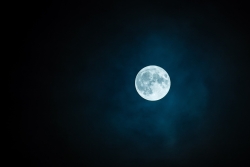 The full moon against a dark night sky