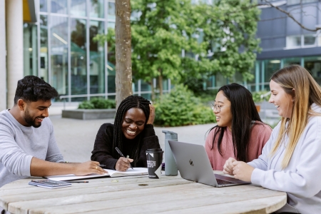 Four University of Portsmouth students talking