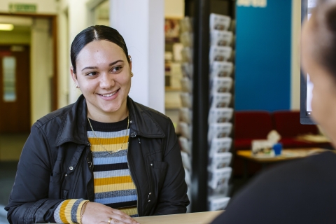 Student talking to staff about financial support